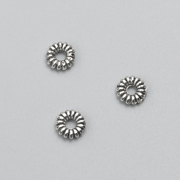 Bead insert findings, diameter 6x2mm, pack 20g, 107pcs+/- metal colour "silver"