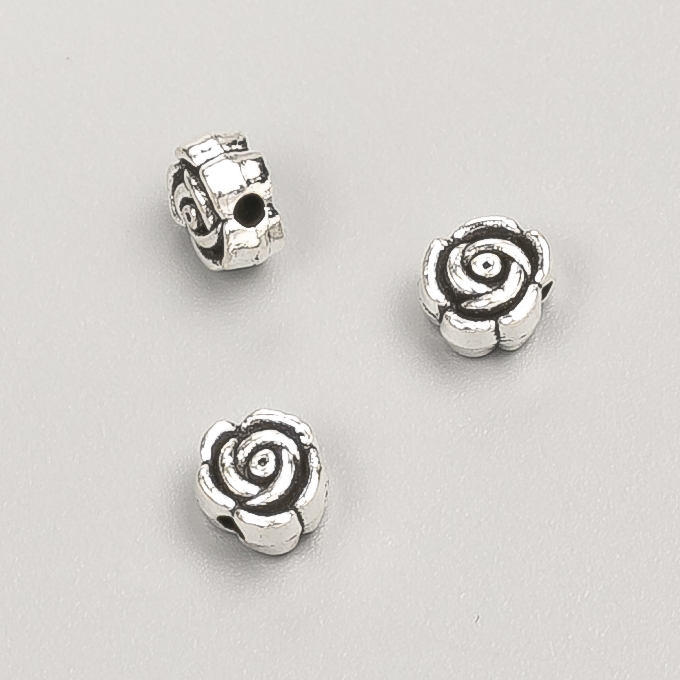 Findings Bead Insert Flower, diameter 7x4mm, pack 20g, 39pcs+/- metal colour "silver"
