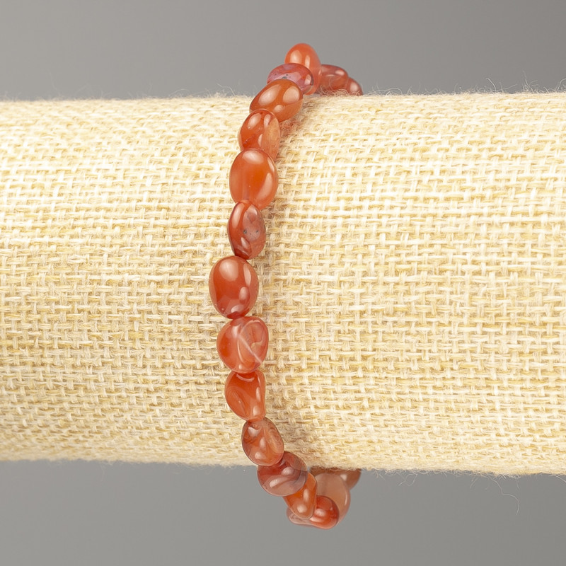 Carnelian Bracelet, natural tumbled stone on elastic cord, diameter 7x8mm+/-, length 18cm
