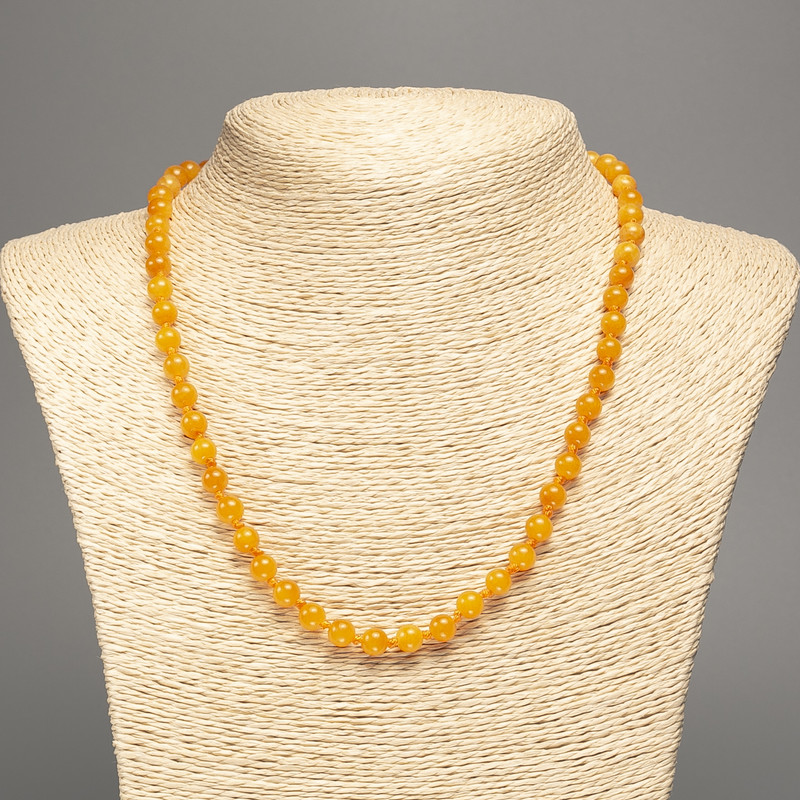 Necklace amber-orange "Amber" smooth round beads, diameter 6mm+/-, length 50cm+/- made from white jade stone (synthetic, dyed)