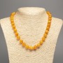 Necklace amber-orange "Amber" smooth round beads, diameter 10mm+/-, length 50cm+/- made from white jade stone (synthetic, dyed)
