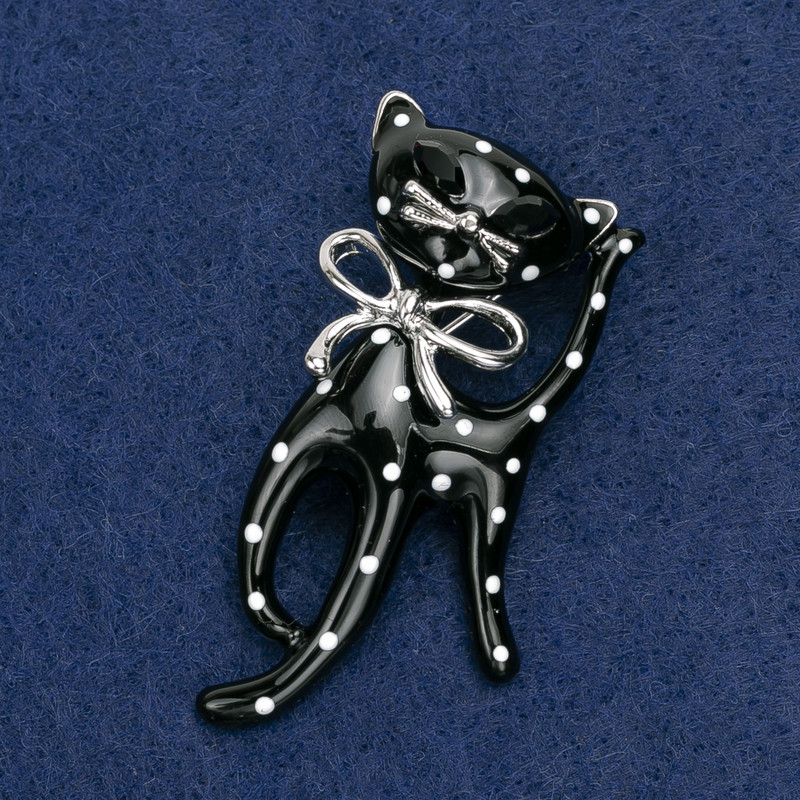Kitten Brooch, white and black acrylic, silver-tone metal 53x25mm
