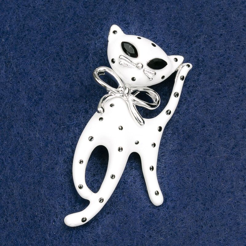 Kitten Brooch, white and black acrylic, silver-tone metal 53x25mm