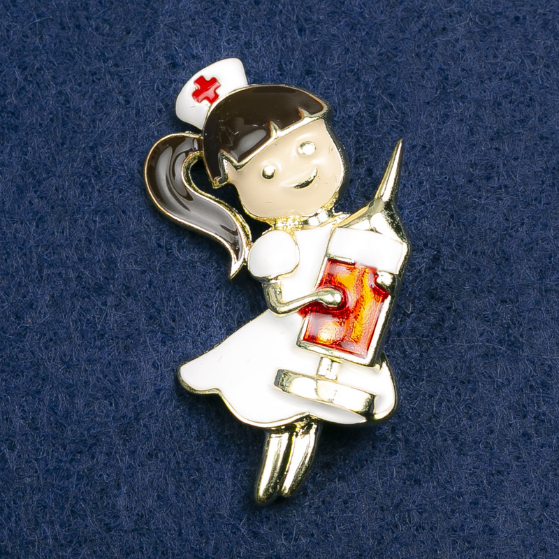 Brooch Nurse, white, black and red enamel, gold-coloured metal 42x31mm