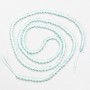 Small beads spinel (synth.) light azure faceted ball, diameter 2mm+/- on a thread, length 37cm