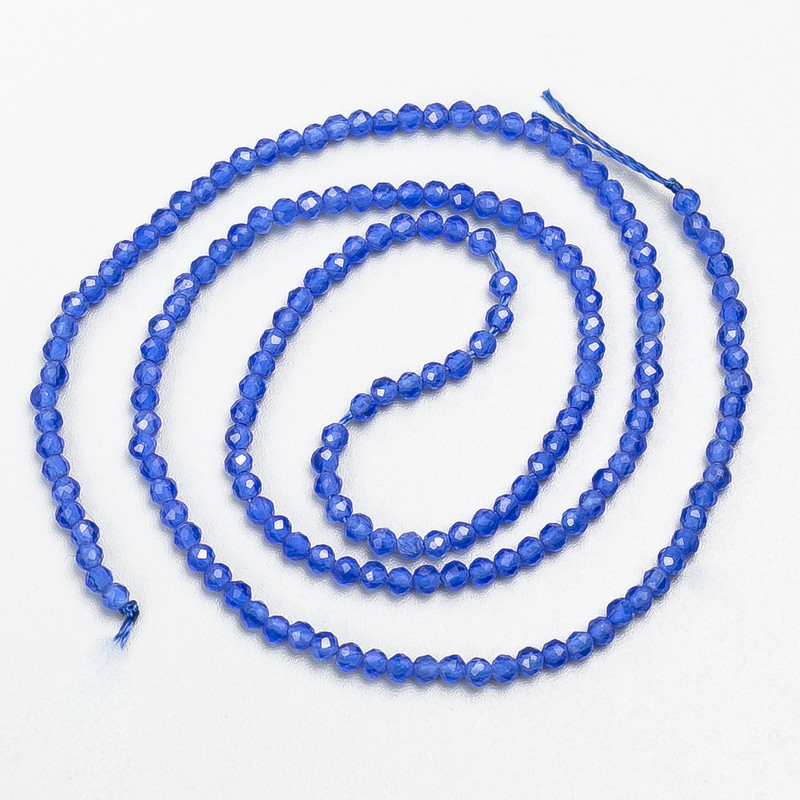 Small beads spinel (synth.) ultramarine blue faceted ball, diameter 2mm+/- on a thread, length 37cm