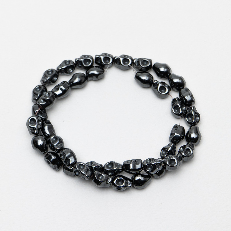 Hematite Skull Beads, diameter 8x10x7.5mm+-, length 39cm+- on a strand