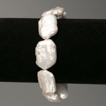 Bracelet of Baroque Pearls in the petrol hue, diameter 14x23mm ±, length 18cm ± (stretch)