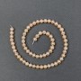Peach river pearls on a thread d 6-7mm±, length 37cm±