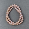 Peach freshwater pearls on a thread, 9x8mm, length 40cm