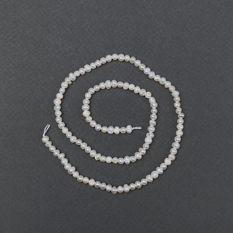 Freshwater oval pearls on a thread, 6x5mm ±, length 35cm ±