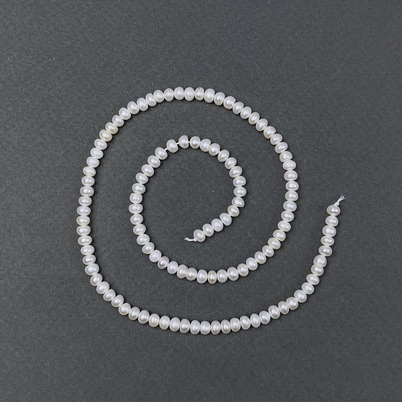 Freshwater pearls on a thread, diameter 4×3mm +-, length 38cm+