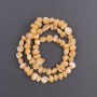 Beads tinted - Peach mother-of-pearl facet-cut, 8x6mm diameter, 41cm length on a nylon thread