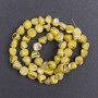 Beads, tinted Mother-of-Pearl Yellow faceted, 8×6 mm, 41 cm length on thread