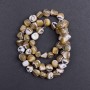 Beads - tinted mother-of-pearl beige faceted, diameter 8x6mm±, length 41cm± on thread