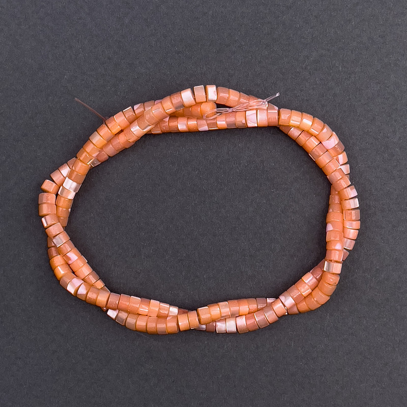 Beads tan coloured mother-of-pearl disk 4x2mm dia, 40cm on thread
