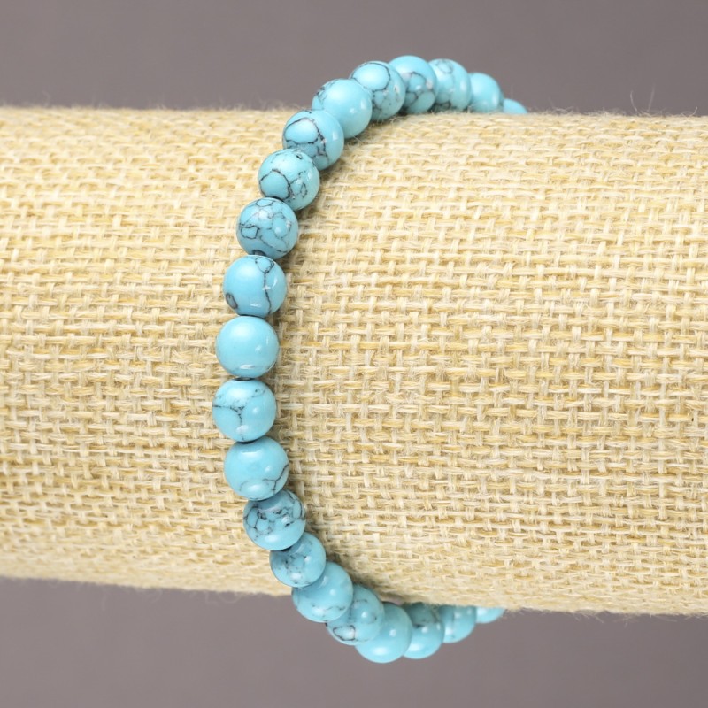 Bracelet on Elastic Turquoise (faceted) smooth beads, diameter 6mm+