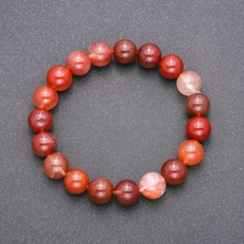 Bracelet made of red rutilated quartz on elastic, smooth beads, diameter 10(+/-)mm, length 18cm