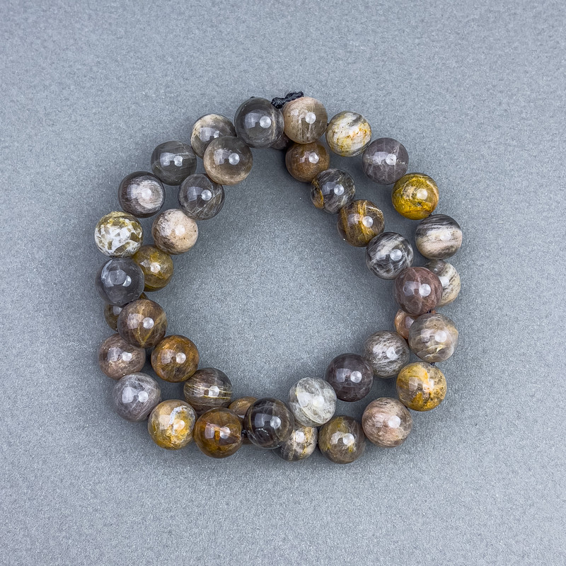 Sunstone Beads natural stone smooth sphere 9.5 mm dia. on thread, 39 cm length