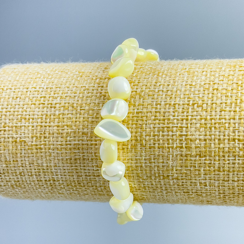 Bracelet Mother-of-Pearl light-yellow faceted beads, diameter 8×6mm±, length 18cm (stretch)