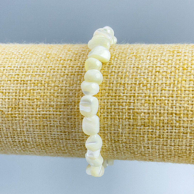 Bracelet White Mother-of-Pearl drilled beads, 8×6mm, stretch, 18cm