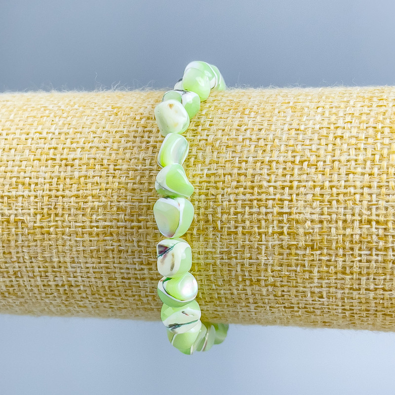 Bracelet Mother-of-Pearl Light Green Faceted Beads, diameter 8×6 mm ±, length 18 cm (stretch)