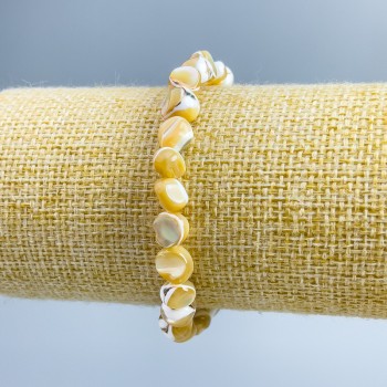 Beige mother-of-pearl bracelet, faceted beads, diameter 8x6mm +-, length 18cm (stretch)