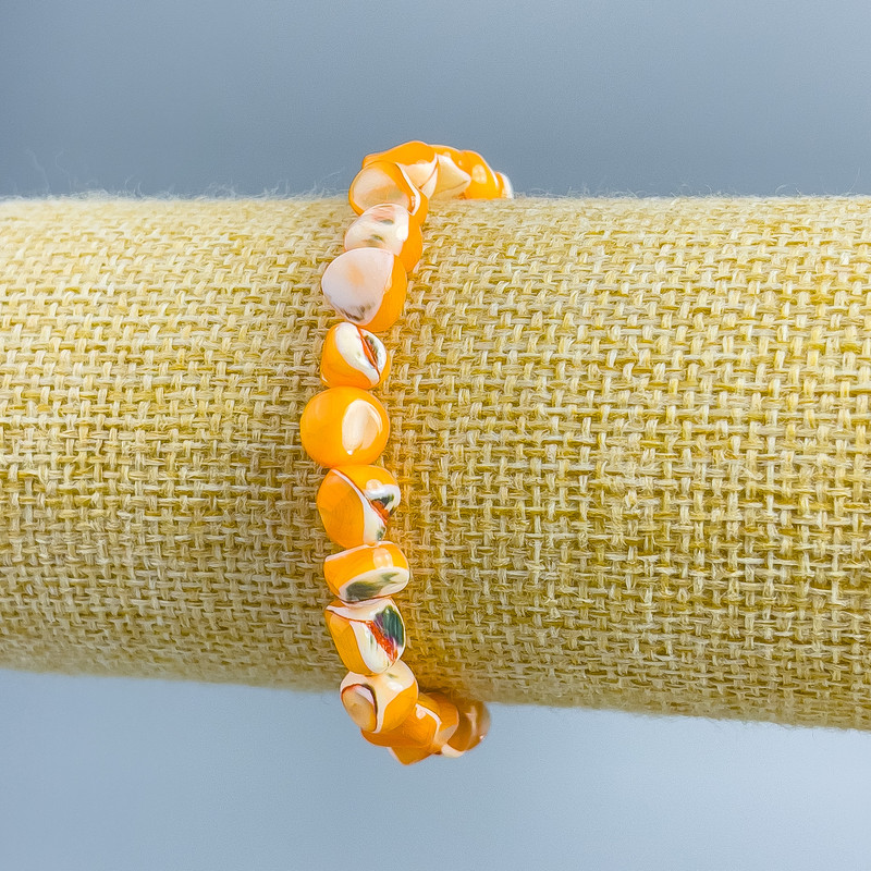 Bracelet Mother-of-Pearl Light Orange Faceted Bead, Ø 8x6mm ±, Length 18cm (elastic)