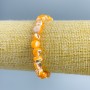 Bracelet Mother-of-Pearl Light Orange Faceted Bead, Ø 8x6mm ±, Length 18cm (elastic)