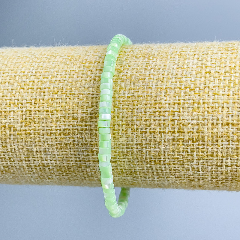 Bracelet Mother-of-PPearl toned light green disc beads, diameter 4x2mm, length 18cm (stretch)