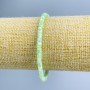 Bracelet Mother-of-PPearl toned light green disc beads, diameter 4x2mm, length 18cm (stretch)