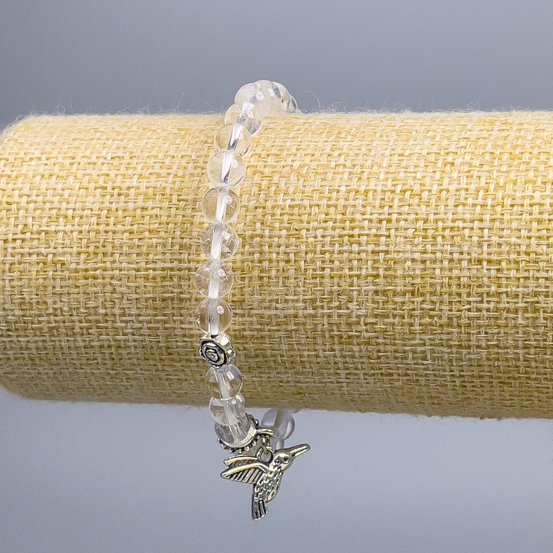 Bracelet Mountain Crystal smooth bead, 6 mm± diameter with silver inserts, length 18 cm (stretch)