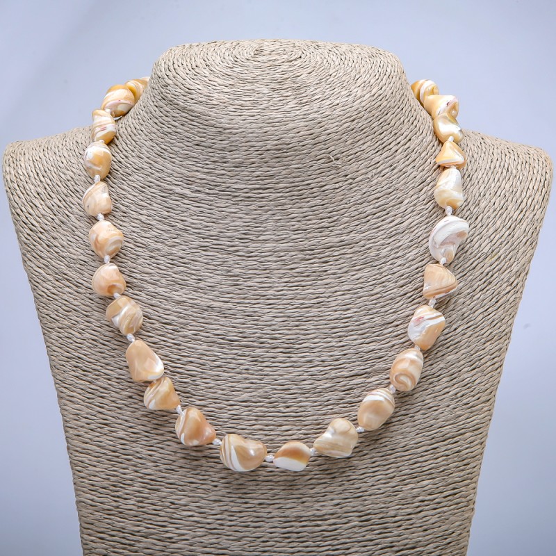 Necklace made from natural beige mother-of-pearl with hammered finish, diameter 19×12mm+-, length 45cm+-