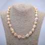Necklace made from natural beige mother-of-pearl with hammered finish, diameter 19×12mm+-, length 45cm+-