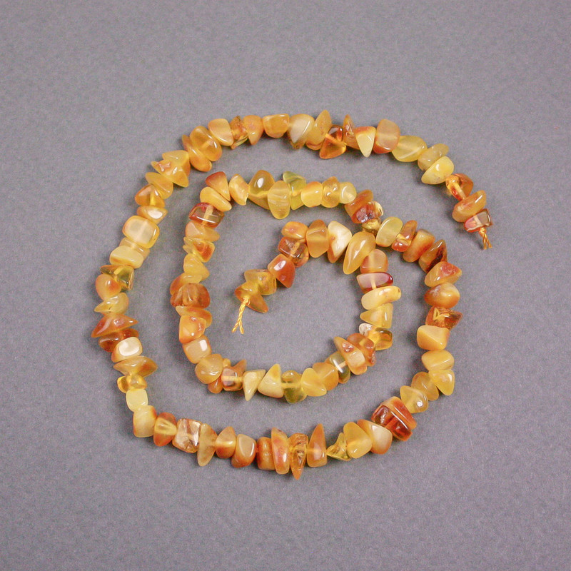 Amber Chip Beads on a Thread, diameter 7x4mm+-, length 39cm+