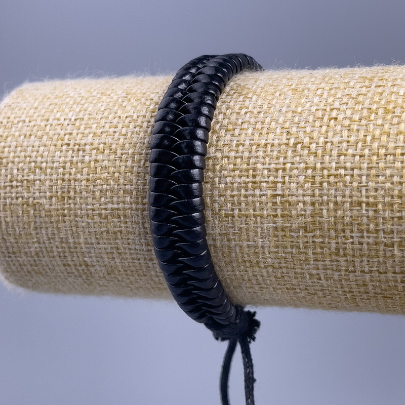 Bracelet, length 18-25cm, thickness 11mm, black eco-leather with a slide clasp