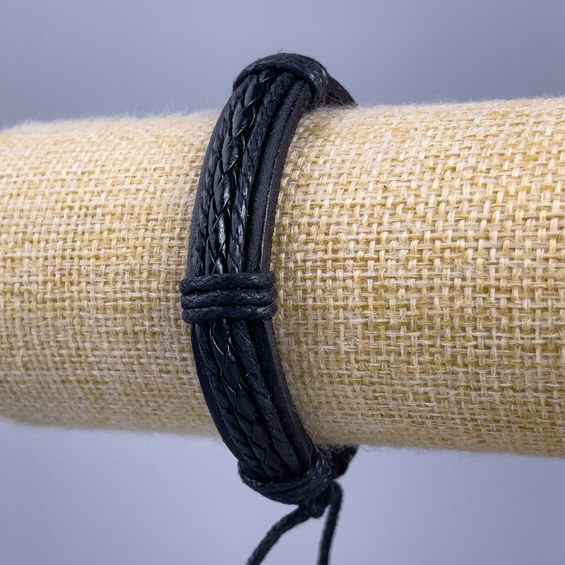 Bracelet, length 18-25cm, thickness 12mm, black eco-leather with a slide clasp