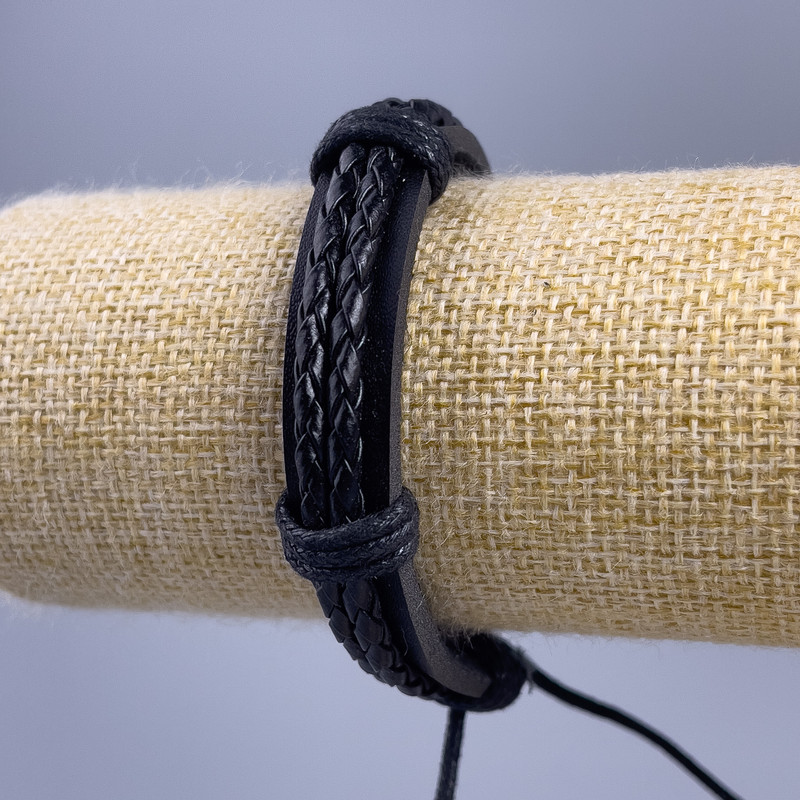 Bracelet, length 18-25cm, thickness 12mm, black eco-leather with a slide clasp