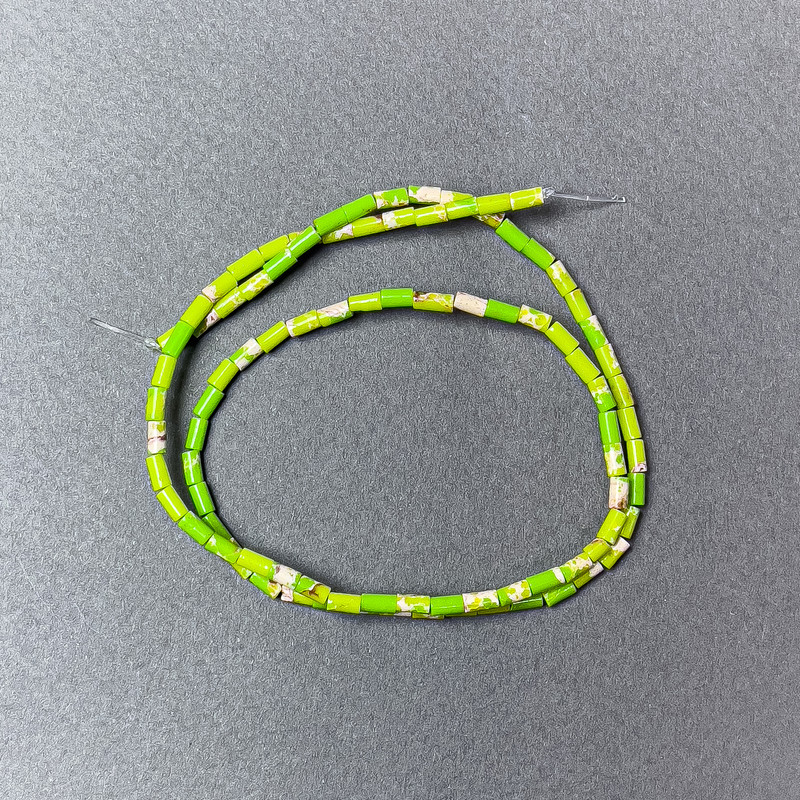 Variscite Beads Light Green (pressed) chip, diameter 2x4mm+/-, length 38cm+/- on fishing line