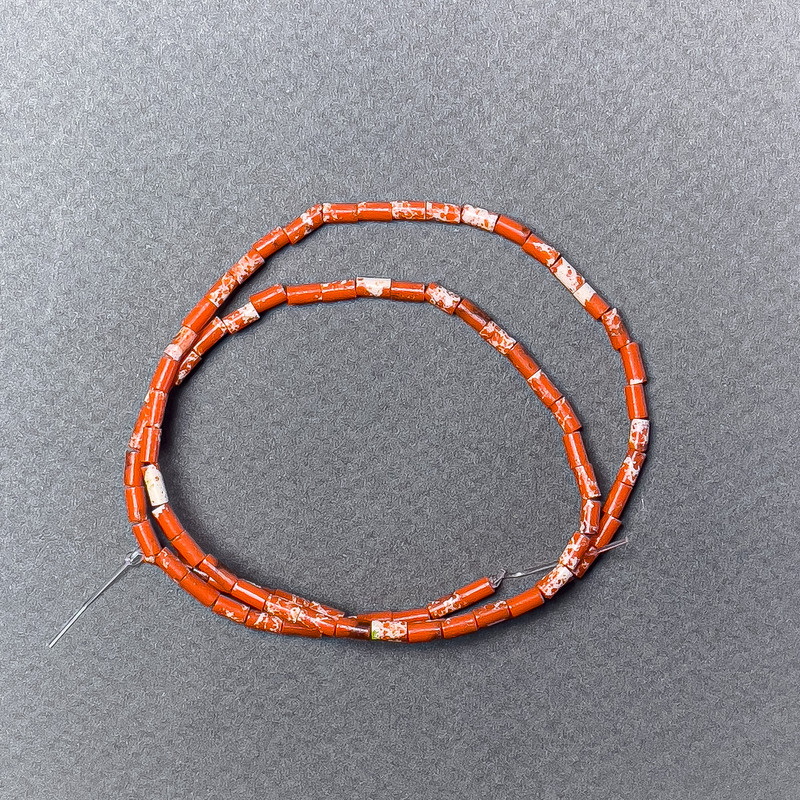 Variscite Beads Orange (pressed) chip, diameter 2x4mm+/-, length 38cm+/- on fishing line