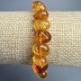 Bracelet Orange Crystal, toned as amber tumbled, diameter 12x8mm+-, length 18cm+- (stretch)