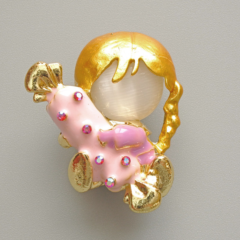Brooch 'Girl with a Candy' with cat's eye white stone, pink and purple enamel, chameleon crystals, gold-tone metal 25×30mm