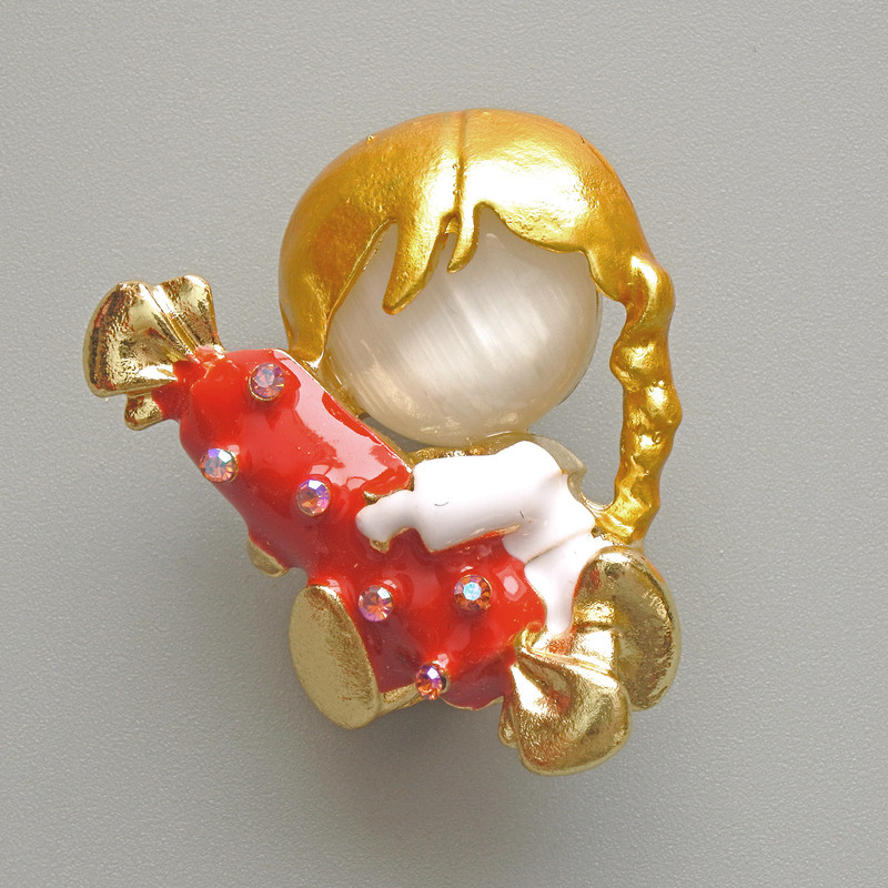 Brooch 'Girl with Candy' White cat’s eye with enamel and rhinestones, chameleon stones, gold-toned metal 25x30mm