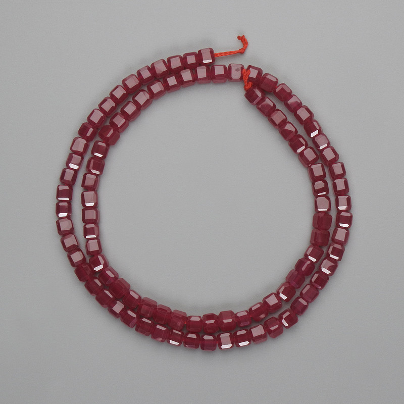 Ruby (corundum) beads faceted cube 4x4mm+- , length 38cm+- on a thread